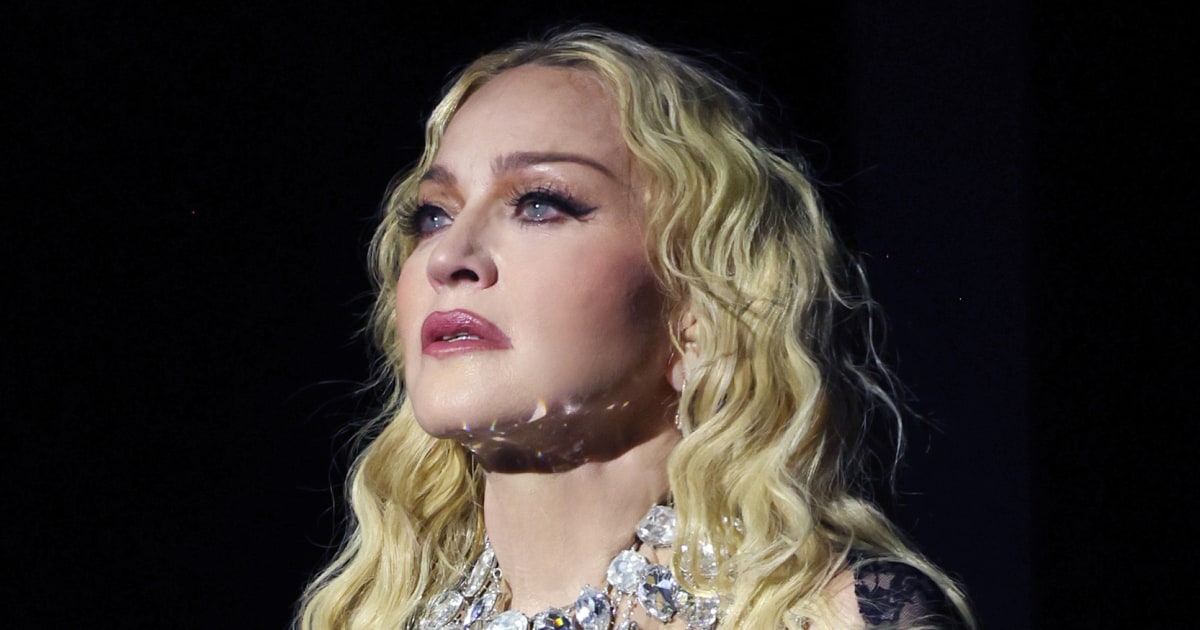 Madonna calls out fan for sitting during concert before realizing they were in wheelchair